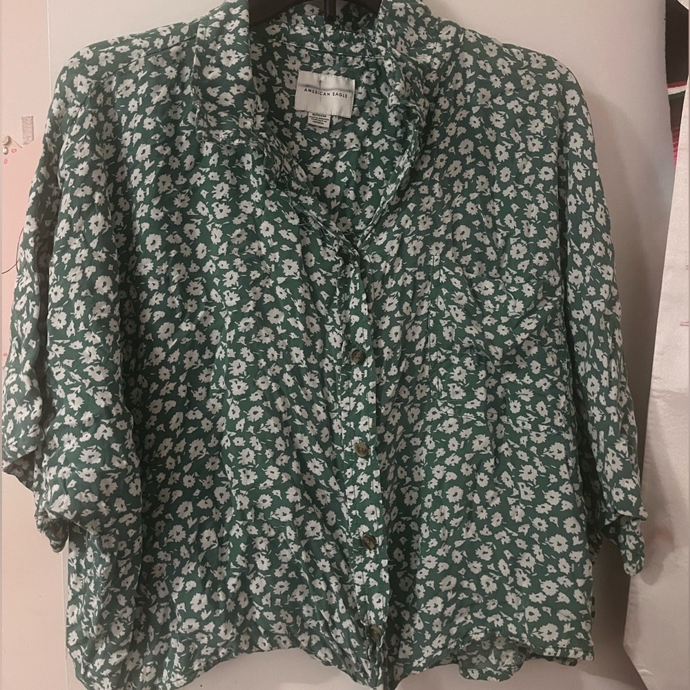 Floral Green Blouse with a collar and a knot tie in the front